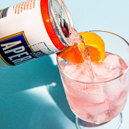 Aperitivo Seltzer Pouring In a Glass